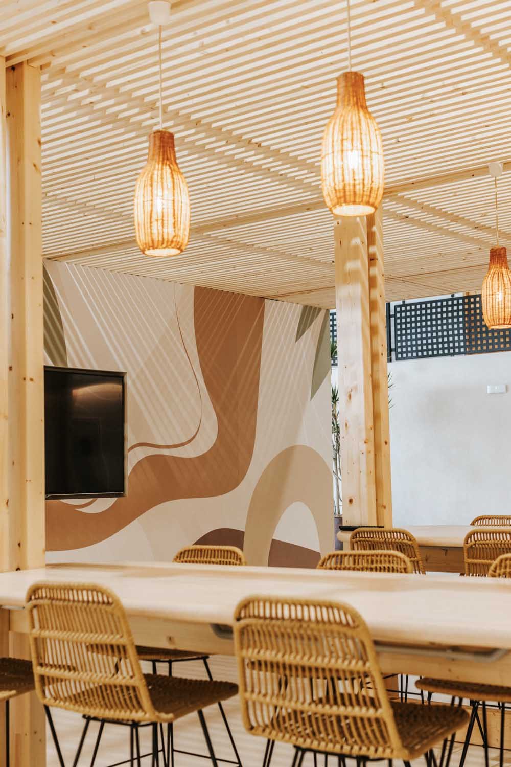 Pergola ceiling with pendant lights over the dining table